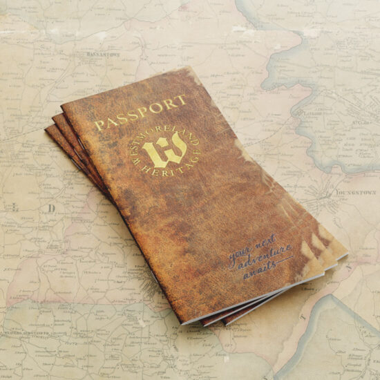 Westmoreland Heritage Passport cover laying on an image of an old Westmoreland County map