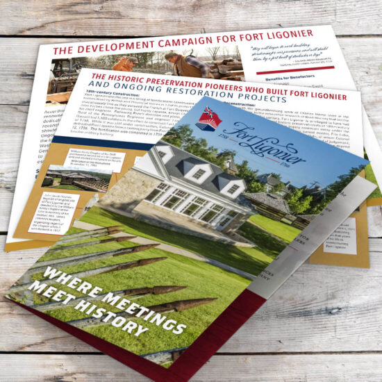 Front cover image of Fort Ligonier printed promotional piece with copies of information sheets which go inside the folder